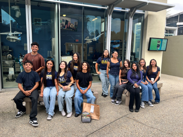 Health Academy sophomores pose in front of the Molina Medical Center at the Aquarium of the Pacific in Long Beach.
